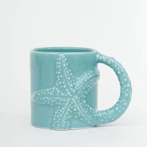 Taza con estrella de mar en relieve