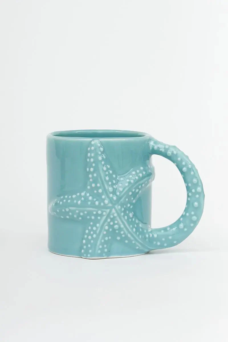Taza con estrella de mar en relieve