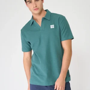 Polo de algodón jacquard con textura y cuello abierto