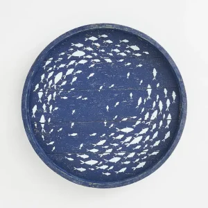 Bandeja redonda azul con banco de peces