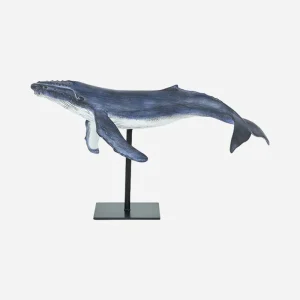 Ballena decorativa sobre base metálica