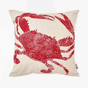 Cojín náutico con un cangrejo rojo