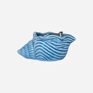 Vela en caracola de cerámica