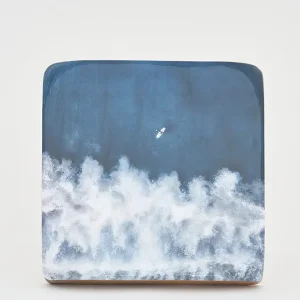 Foto sobre taco de madera surf. Surf y olas