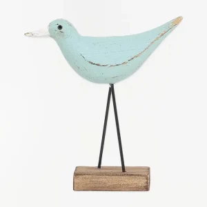 Original figura de pájaro turquesa y pico en contraste blanco