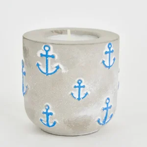 Portavelas de cemento con anclas azules