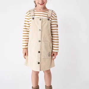 Pichi de pana tipo peto con botones y bolsillos frontales