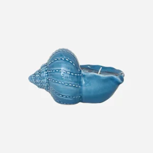 Vela decorativa en caracola azul