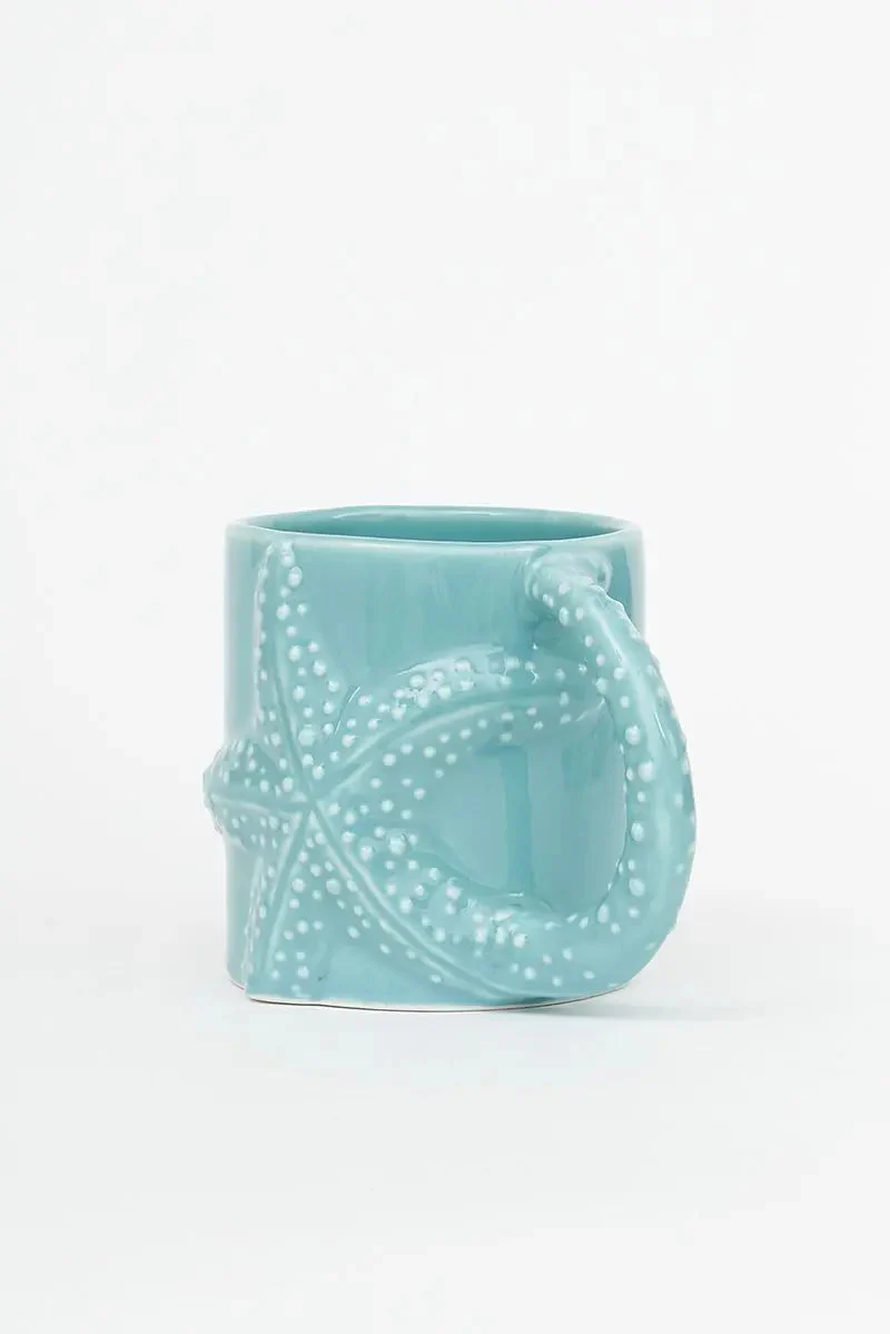 Taza con estrella de mar en relieve – Image 3